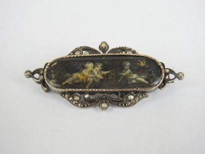 Antique brooch with grisaille painting on...