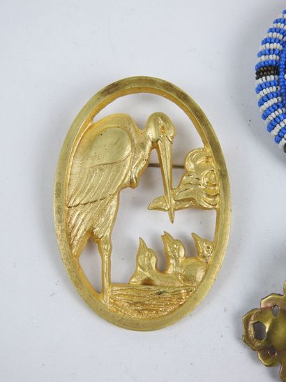 FOUR fancy antique PINS, one in gilded metal...