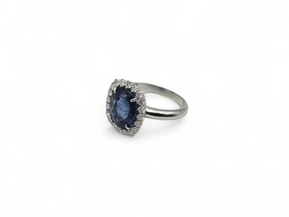750 thousandths white gold pompadour ring...