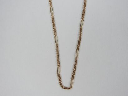 Three chains and pendant in 750 thousandths...