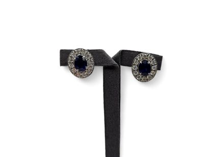 Pair of 750 thousandths white gold oval stud...