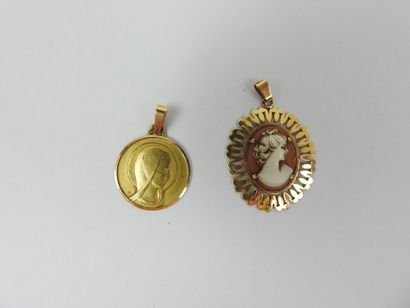 Two pendants in yellow gold 750 thousandths,...