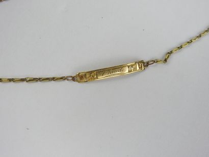 Three chains and pendant in 750 thousandths...