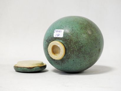 Modern work
Stoneware ovoid covered pot on...