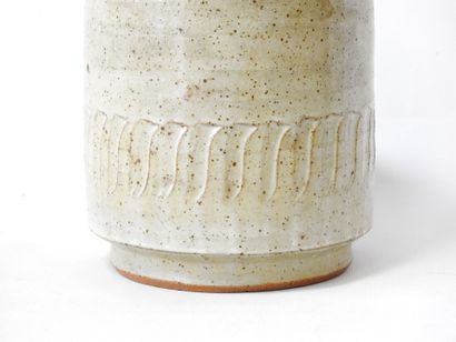 Cylindrical lamp base in beige-glazed stoneware...