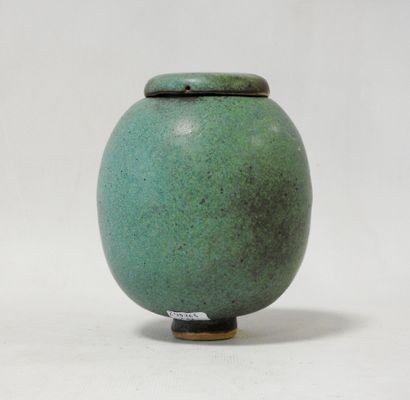 Modern work
Stoneware ovoid covered pot on...