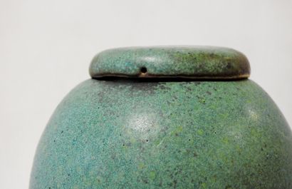 Modern work
Stoneware ovoid covered pot on...