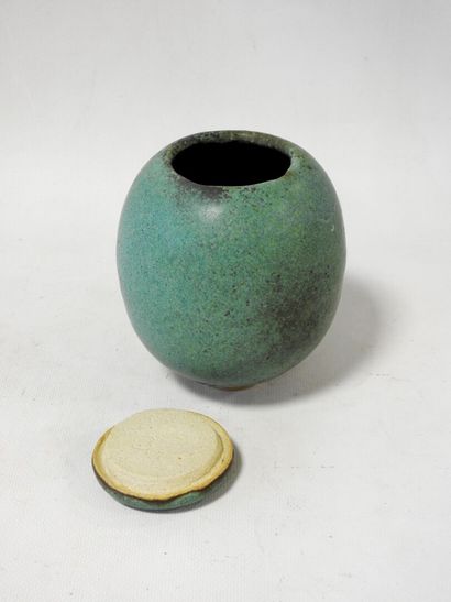 Modern work
Stoneware ovoid covered pot on...