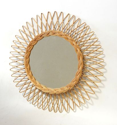 Work from the 70s
Rattan circular sun mirror.
Diameter:...