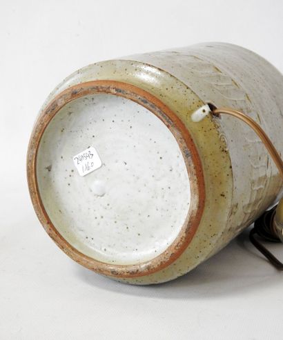 Cylindrical lamp base in beige-glazed stoneware...