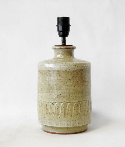 Cylindrical lamp base in beige-glazed stoneware...