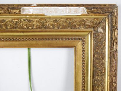CADRE NU en bois et stuc doré à décor de...