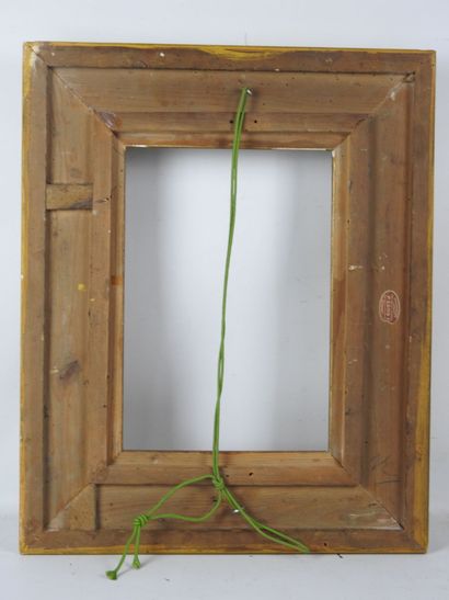 CADRE NU en bois et stuc doré à décor de...