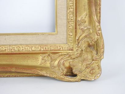 IMPORTANT BARE FRAME in wood and gilded stucco,...