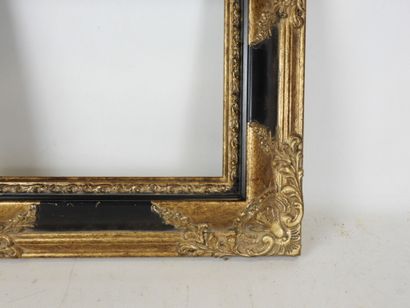 CADRE NU en bois teinté noir et stuc doré...