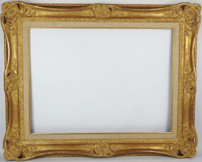 IMPORTANT BARE FRAME in wood and gilded stucco,...