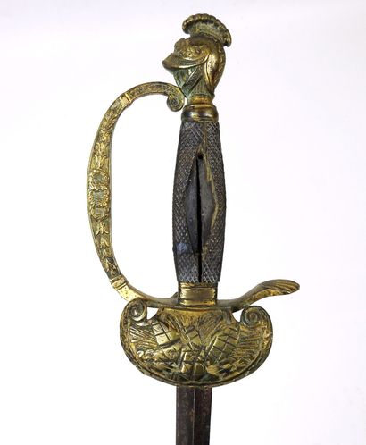 WHITE WEAPONS. Officer's sword, chased brass...