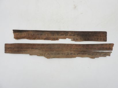 Rare pair of wooden strips inscribed with...