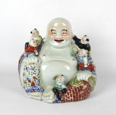 CHINA: Budai Buddha in porcelain and polychrome...