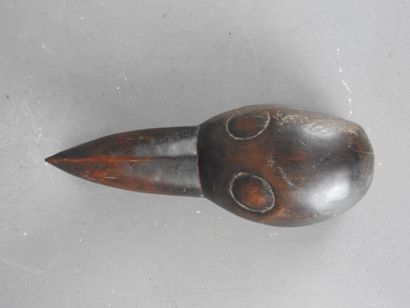DAN, IVORY COAST. Diminutive mask with bird's...