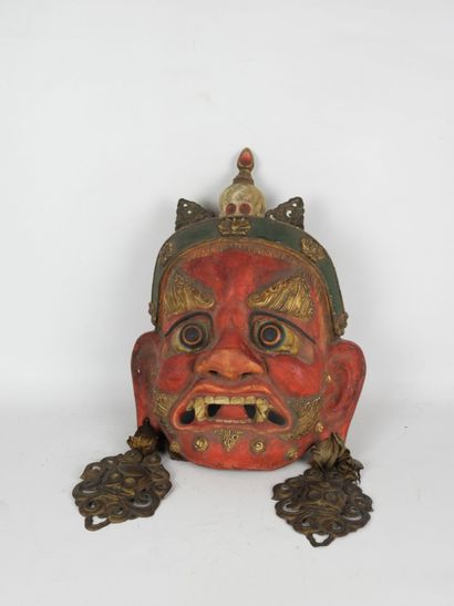CHINA: Wood and metal mask representing the...