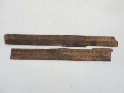 Rare pair of wooden strips inscribed with...
