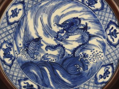 CHINA: Large carved exotic wood screen adorned...