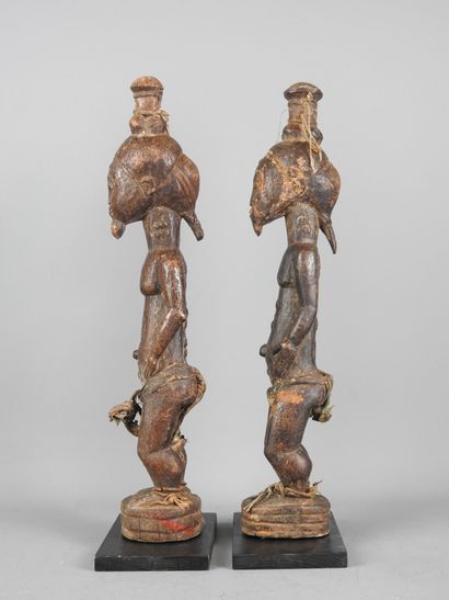 Baule Ivory Coast: Two carved wooden statues...