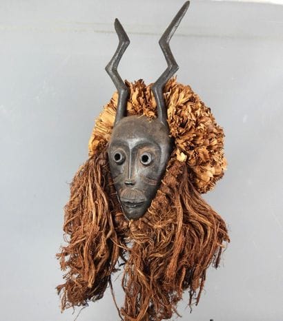 AFRICA. Dance mask with face surmounted by...