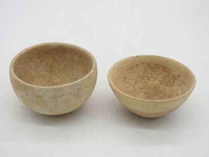 Ancient Orient. 2 antique beige ceramic bowls....