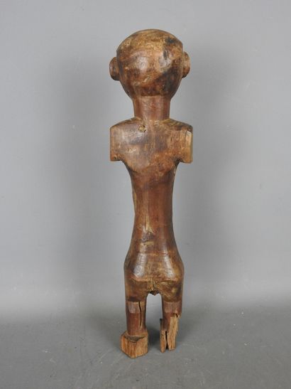 IVORY COAST. Male statue. H. 32.5 cm. Damage...