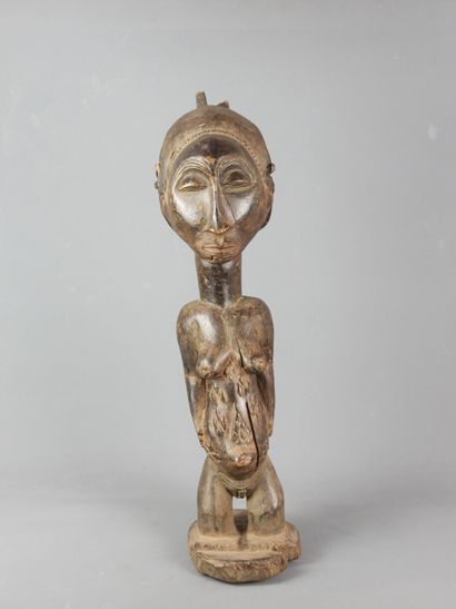 Statue of a standing female ancestor, LUBA/HEMBA,...