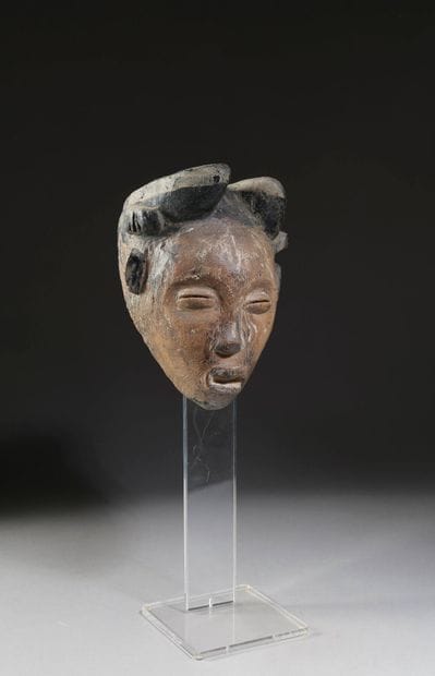 Masque de danse à visage féminin, GABON.
Bois...