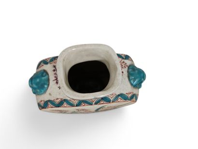 A polychrome porcelain gourd vase decorated...