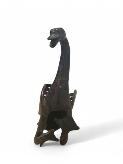 CHINE, XXe.
Oie.
Sujet en bronze patiné gravé.
16,5...