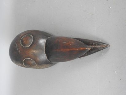DAN, IVORY COAST. Diminutive mask with bird's...
