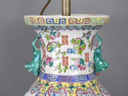 CHINA. Porcelain baluster lamp decorated...