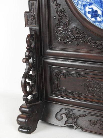 CHINA: Large carved exotic wood screen adorned...