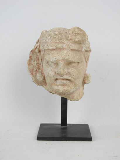 Gandhara art. Male head in stucco wearing...