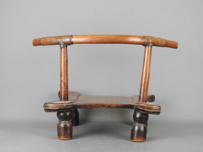 DAN, Ivory Coast. Wooden chair with brown...