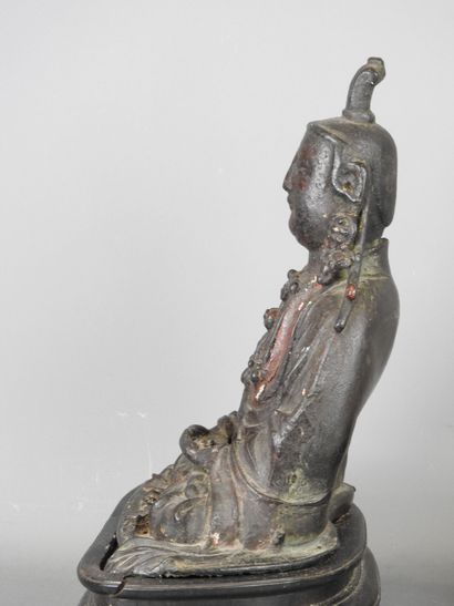 BOUDDHA as a tailor, patinated bronze. Early...
