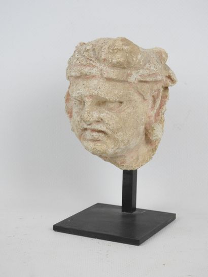 Gandhara art. Male head in stucco wearing...