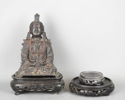 BOUDDHA as a tailor, patinated bronze. Early...