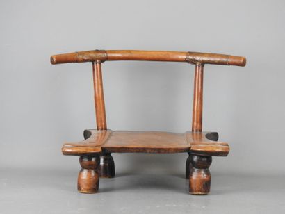 DAN, Ivory Coast. Wooden chair with brown...