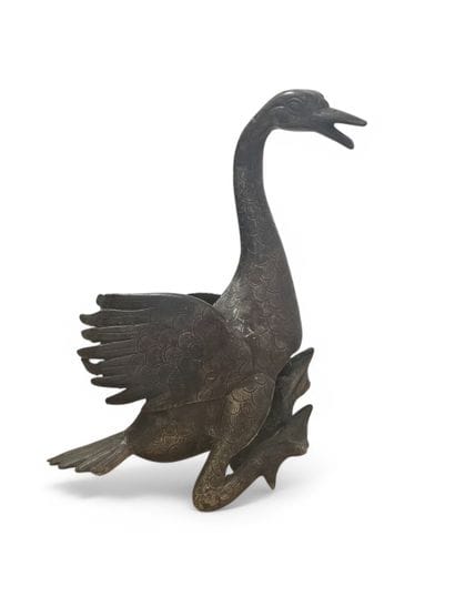 CHINE, XXe.
Oie.
Sujet en bronze patiné gravé.
16,5...