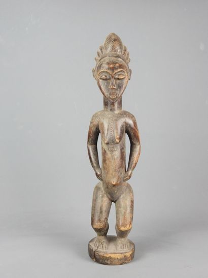 BAOULE, Côte d'Ivoire.

Statue en bois représentant...