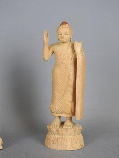 Four wooden STATUETTES representing deities...