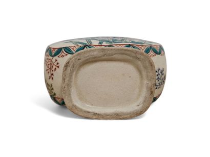 A polychrome porcelain gourd vase decorated...