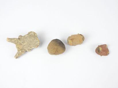 FOUR pre-Columbian FIGURES in stone and clay....