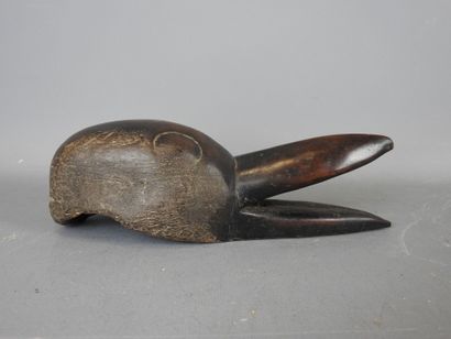 DAN, IVORY COAST. Diminutive mask with bird's...